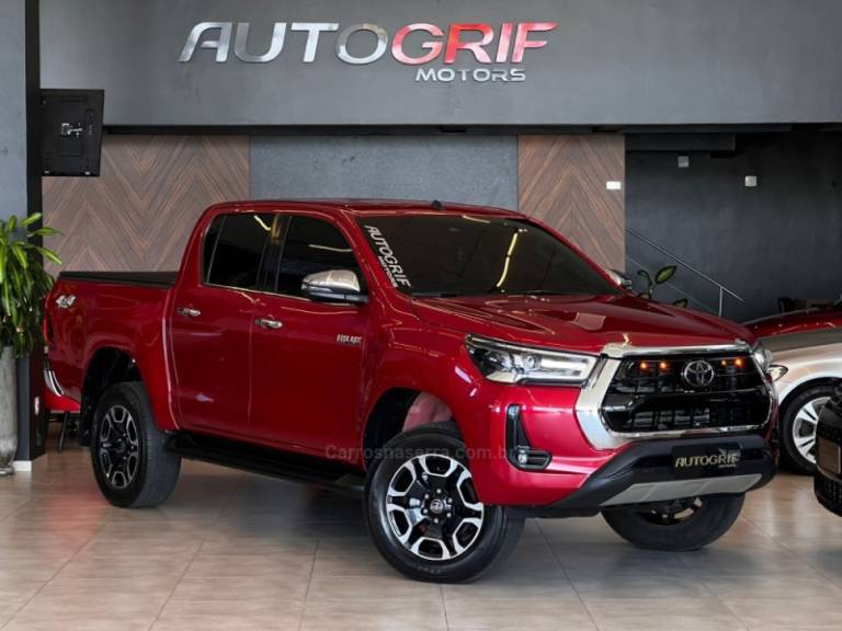 TOYOTA - HILUX - 2021/2021 - Vermelha - R$ 244.900,00