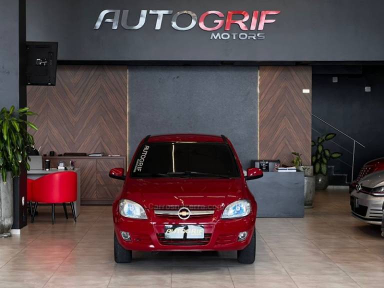 CHEVROLET - PRISMA - 2009/2010 - Vermelha - R$ 28.900,00