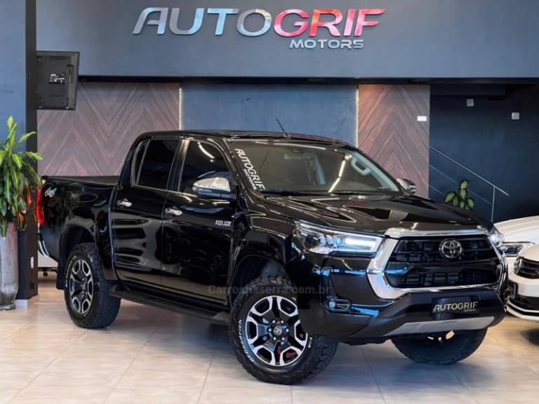 TOYOTA - HILUX - 2021/2021 - Preta - R$ 244.900,00