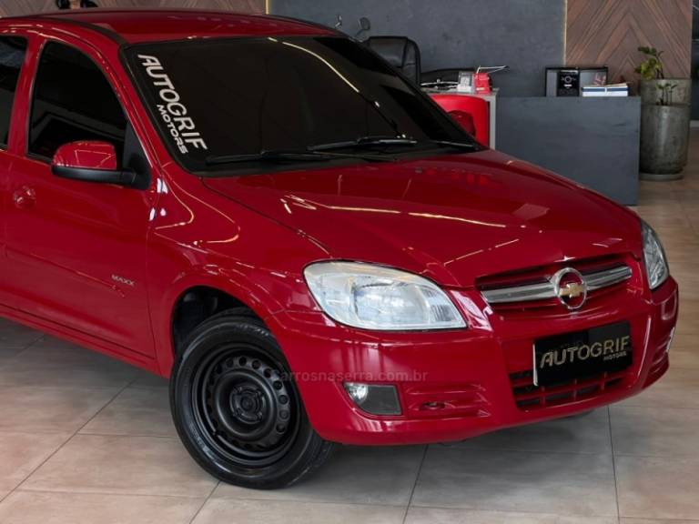 CHEVROLET - PRISMA - 2009/2010 - Vermelha - R$ 28.900,00