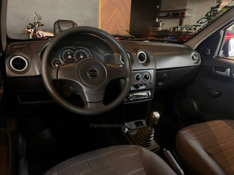 CHEVROLET - PRISMA - 2009/2010 - Vermelha - R$ 28.900,00