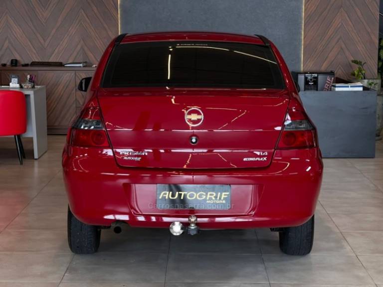 CHEVROLET - PRISMA - 2009/2010 - Vermelha - R$ 28.900,00