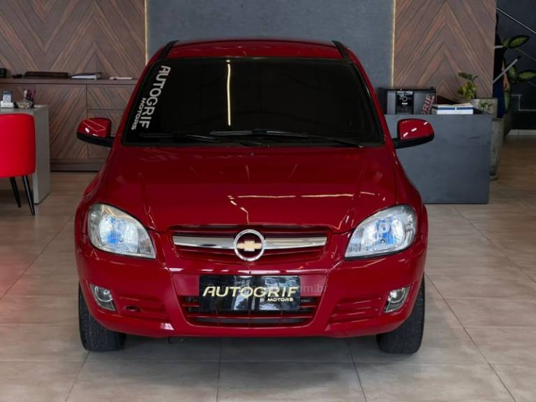 CHEVROLET - PRISMA - 2009/2010 - Vermelha - R$ 28.900,00