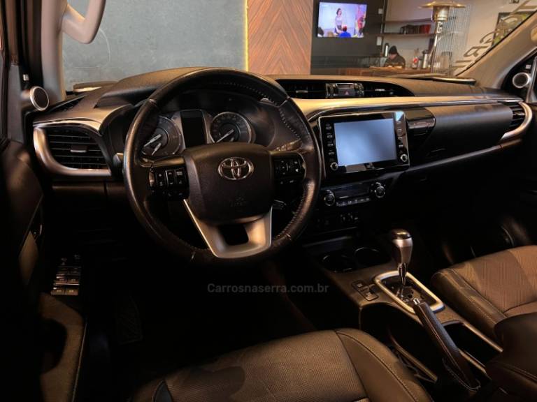 TOYOTA - HILUX - 2021/2021 - Preta - R$ 239.900,00