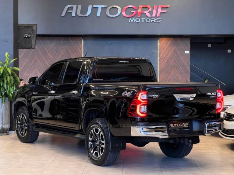 TOYOTA - HILUX - 2021/2021 - Preta - R$ 239.900,00
