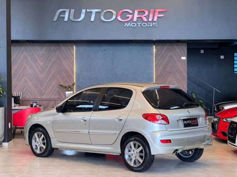 PEUGEOT - 207 - 2012/2013 - Bronze - R$ 27.900,00